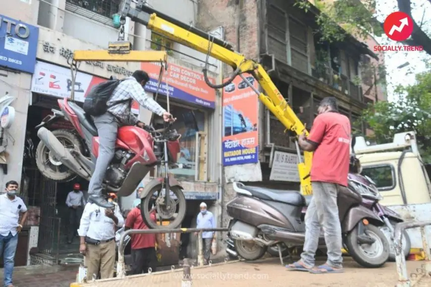 Bike lifted by the crane along with the rider